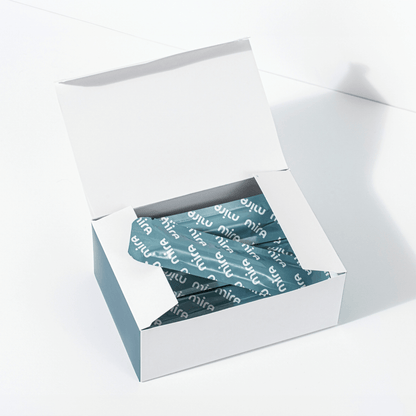 White box containing 20 Mira Fertility Plus wands with teal patterned packaging visible inside.