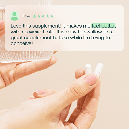 Five-star customer review of Mira fertility supplement with hands holding white capsule pill and glass of water