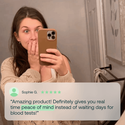Woman taking mirror selfie with surprised expression next to 5-star review praising real-time fertility health results over blood tests