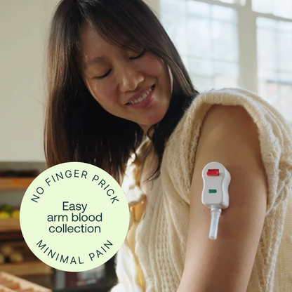 Woman wearing beige towel with blood collection device attached to arm; green circular label indicates "Easy arm blood collec