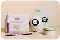 Mira Max fertility monitor kit with device, test wands, and app display for hormone tracking