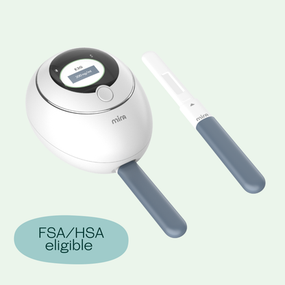 White and gray Mira starter kit with round device displaying digital screen and two handheld applicators with gray grips.